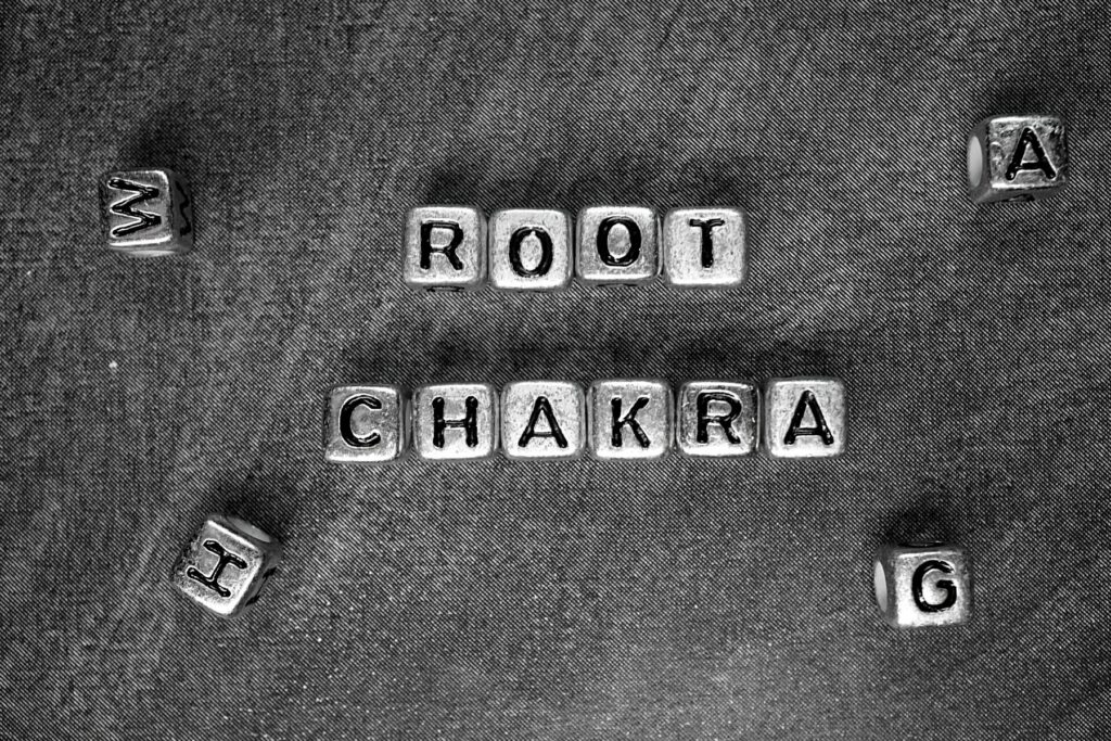 Root Chakra spelled out on a black board.